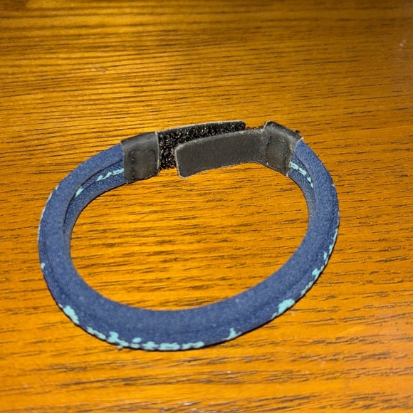 Navy Blue Phiten Athletic Wristband with Sleek Design and Flexible Material - Picture 2 of 3